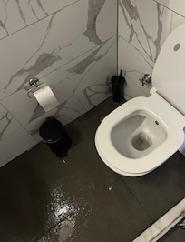 Bathroom pool due to ceiling leakage