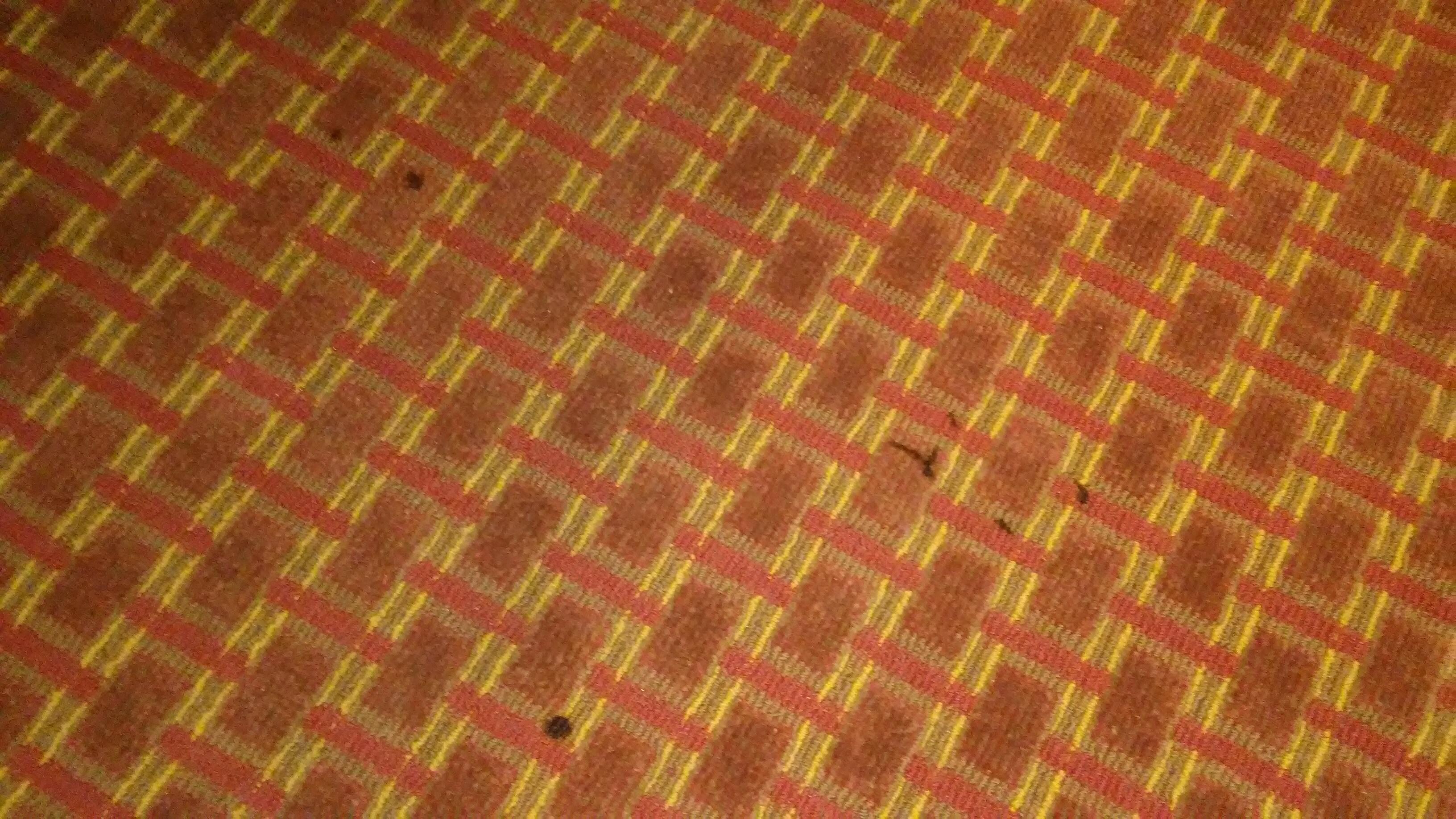 Cigarette Burn on bed sheet in Non Smoking Room
