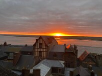 Nascer do sol visto da janela do quarto