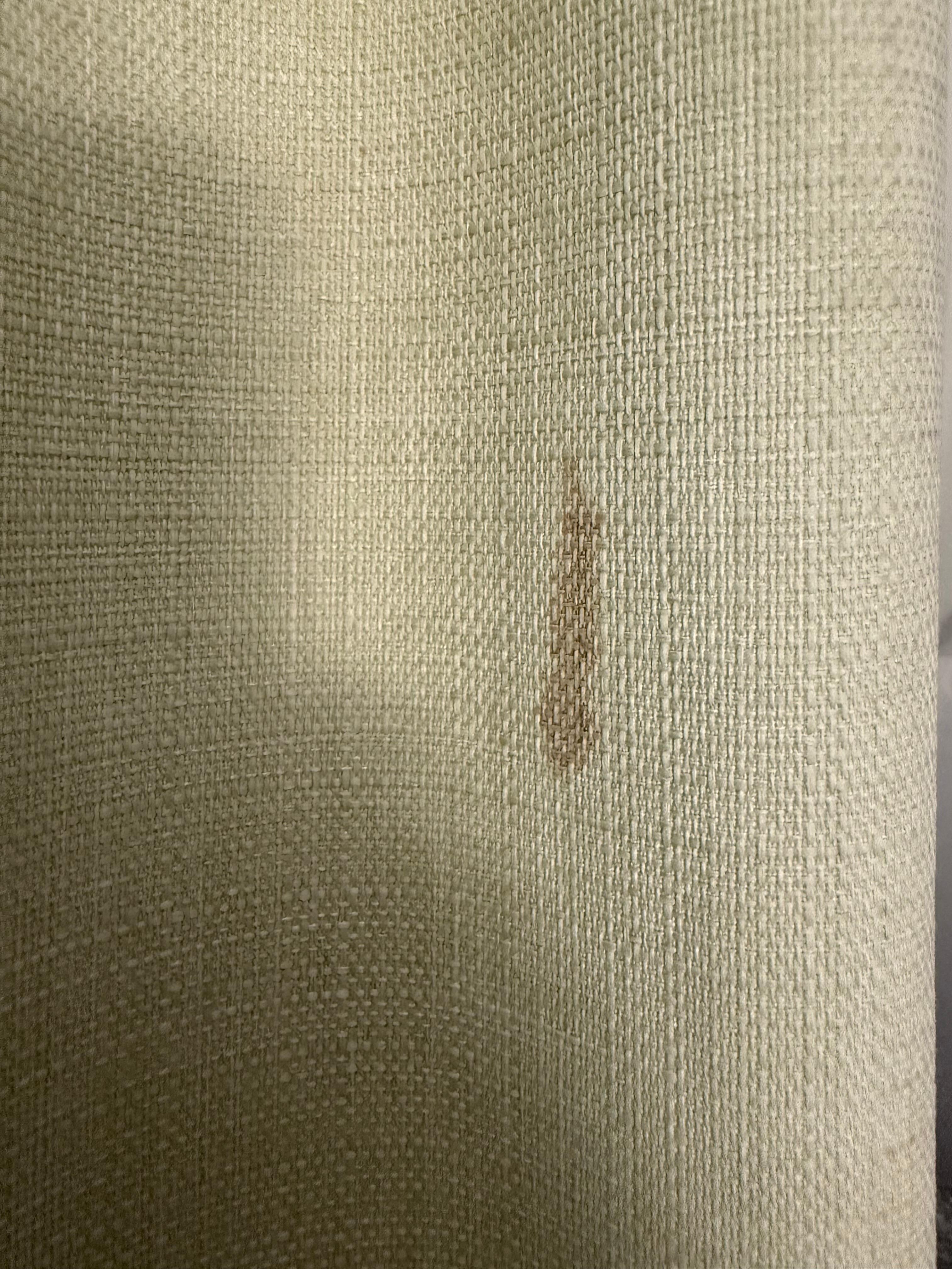 Stains on curtain.