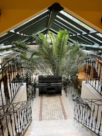 Stairs down to bar and breakfast area