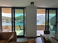 View looking out towards balcony from living room