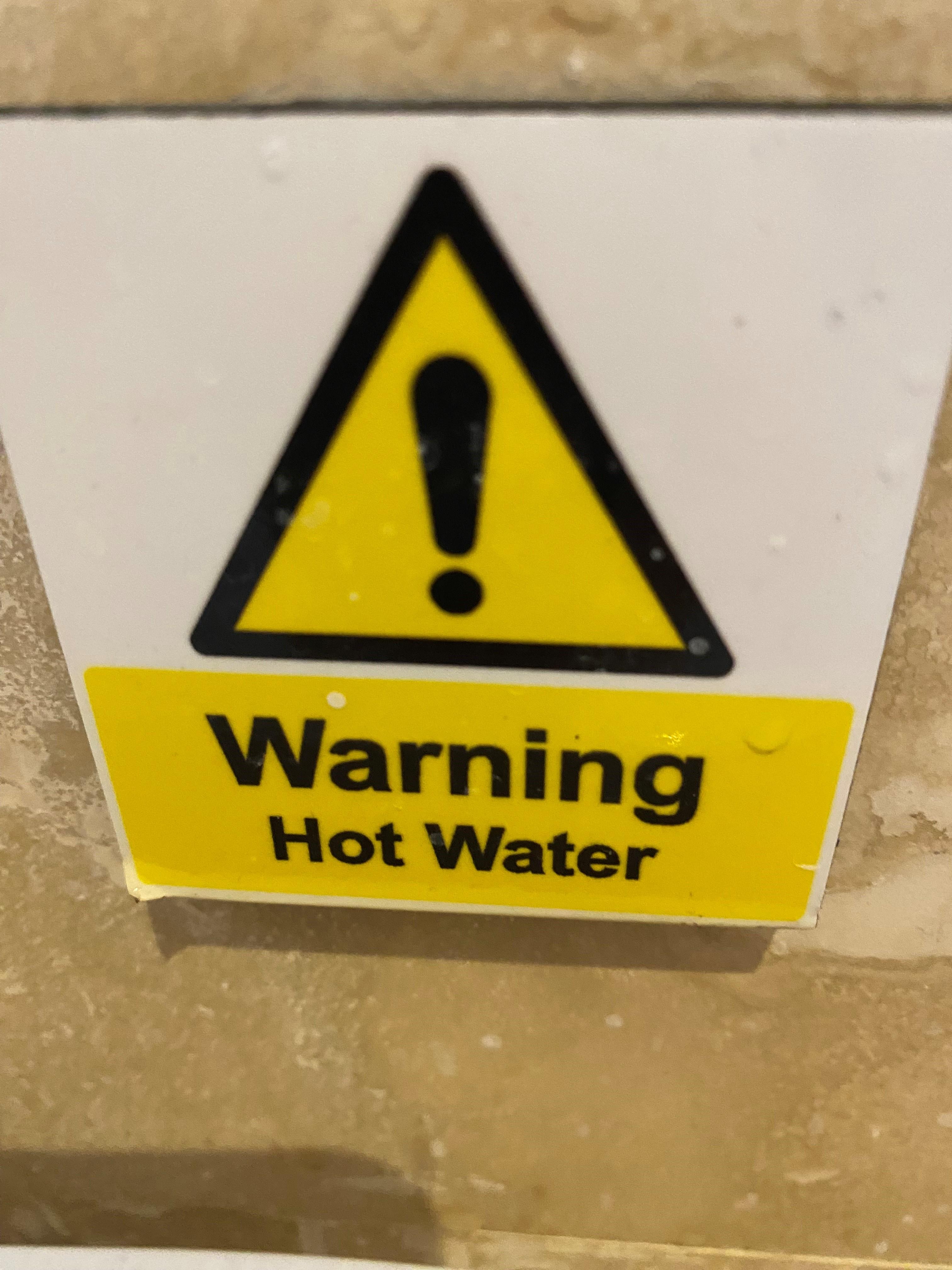 Hot water warning for the sink. The shower needed a serious health warning (as in 'Do Not Use') as it only offered scalding hot water,