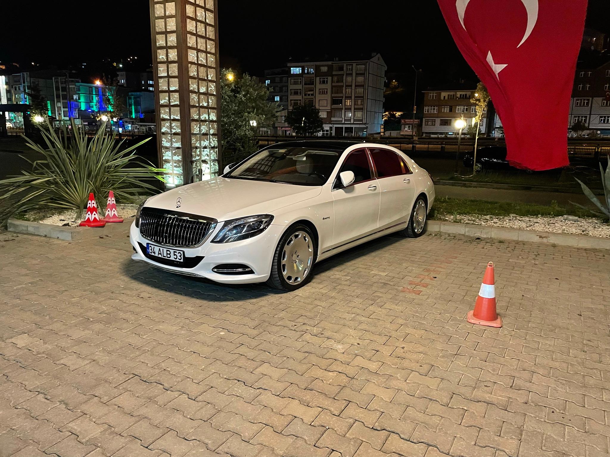 Fancy car in front of main entrance (not our car)