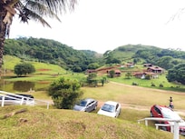 Vista da suíte com os bangalôs ao fundo