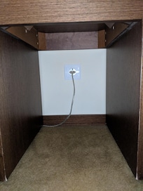 As you can see the only socket is for the bedside light.  You need to bring your own multiplug. I asked at reception and they had none to give me.