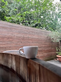Early morning coffee listening to the birds whilst enjoying a dip in the hot tub!