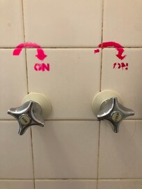 Backward taps with tacky signage