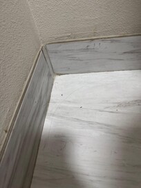 More hair in the corner.