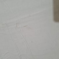 Dirty sheets on bed