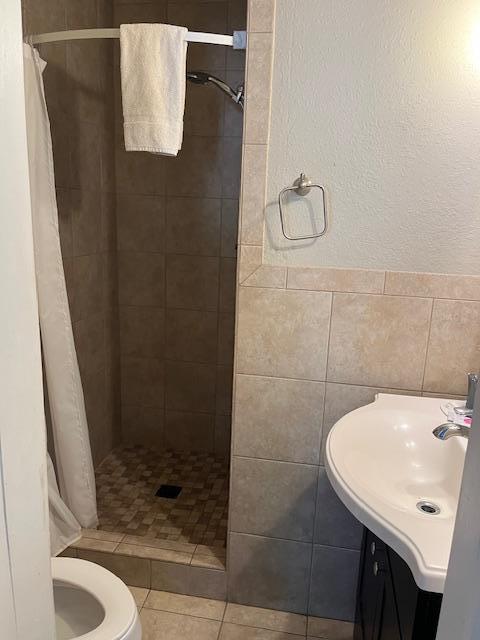 Shower, vanity, toilet