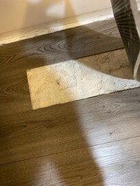 Tiles not glued down and concrete floors deteriorating