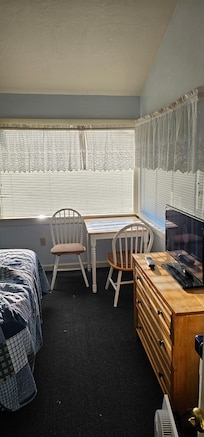 Corner of room with convenient table.