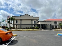 Main entrance, large parking area