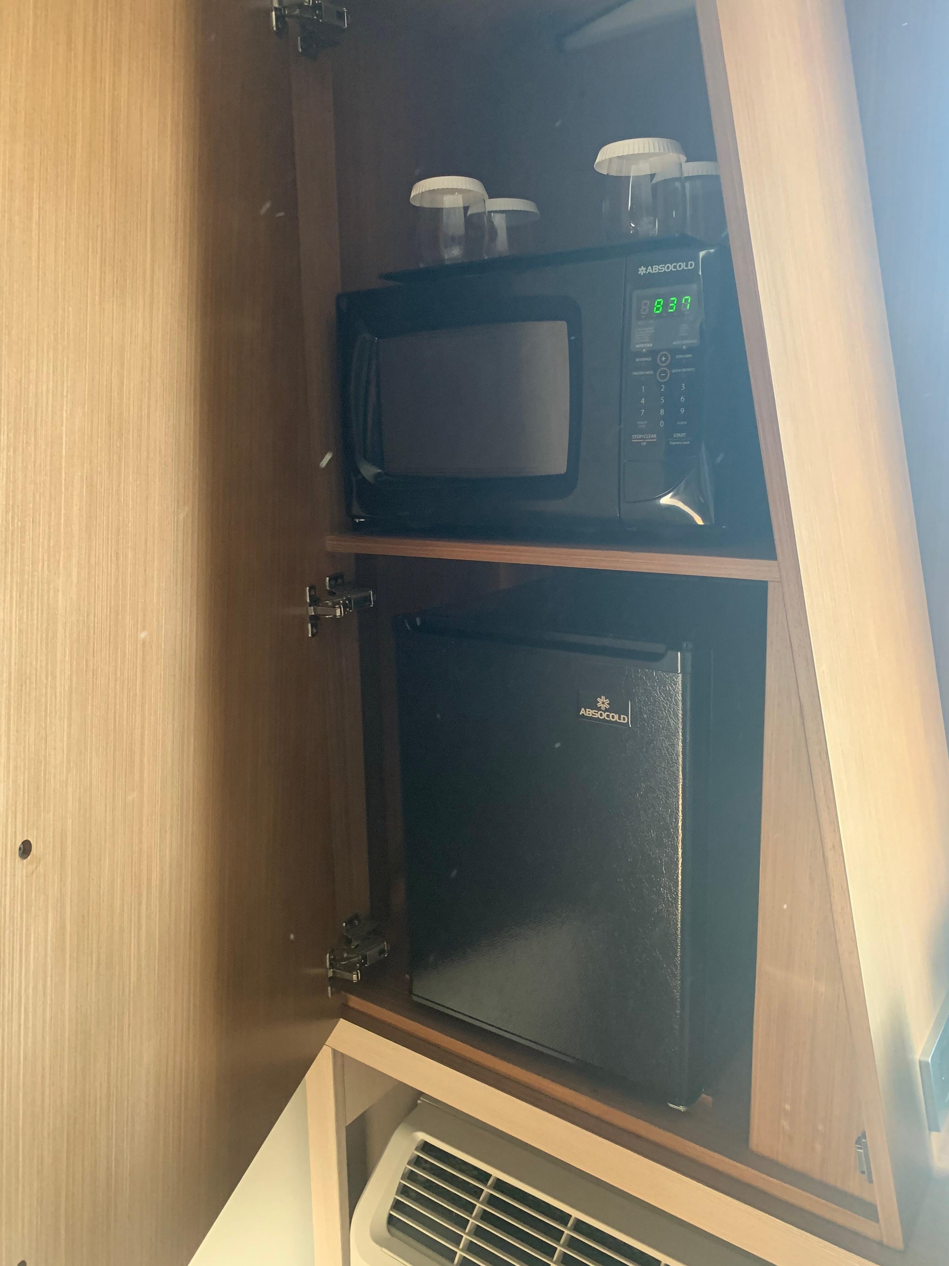In room microwave, mini fridge, and coffee maker. 