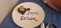 Complimentary birthday cake for my partner along with a birthday song and dance by the staff.