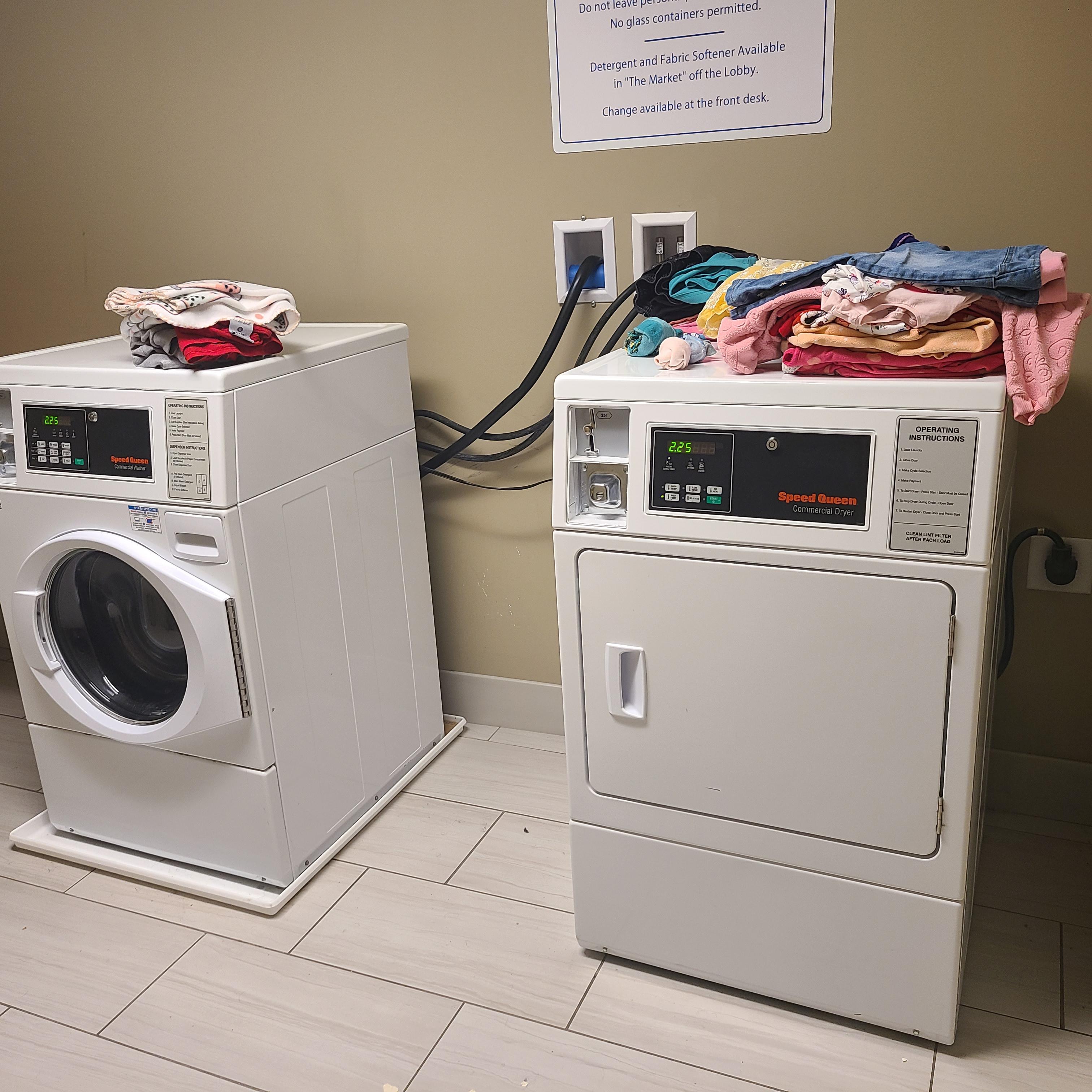 Washer & dryer are $2.25 each and work perfectly there is a ln area to fold laundry to the side of the washer.