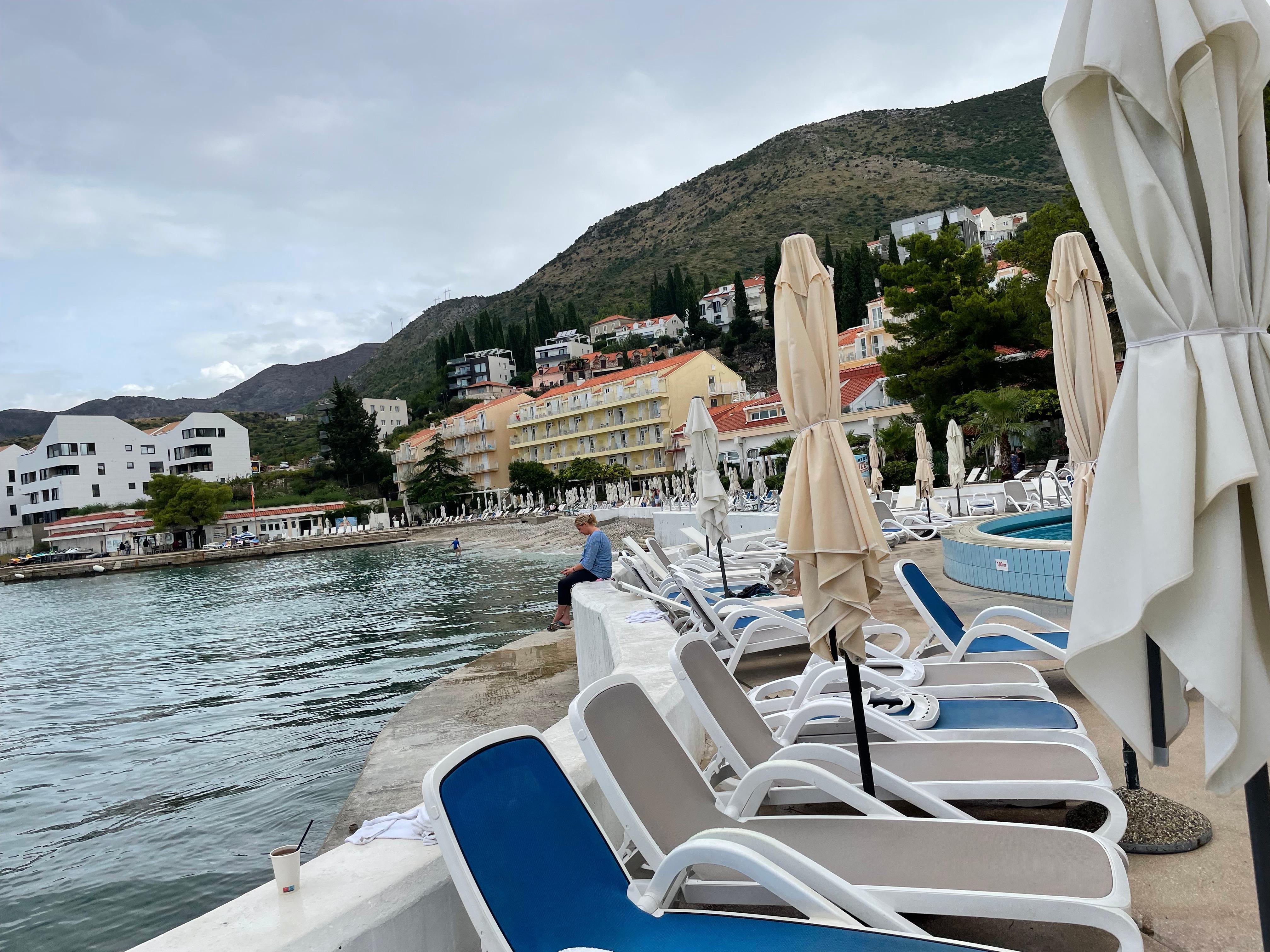 Swimming pool chairs and umbrellas.