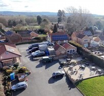 Taken from 35 metres up. The accommodation is on the left of the photo, the breakfast room & restaurant is through white doors on right