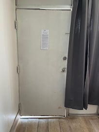 There were big gaps in the room entrance door.( in the upper right side and the lower left side) This was an exterior door so the room was exposed to outside conditions. The gaps were large enough that mice could have walked right through.
