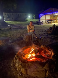 An inviting camp fire. Both of us can remember back to our childhood sitting around a camp fire. The more love is shared the more quickly love grows.