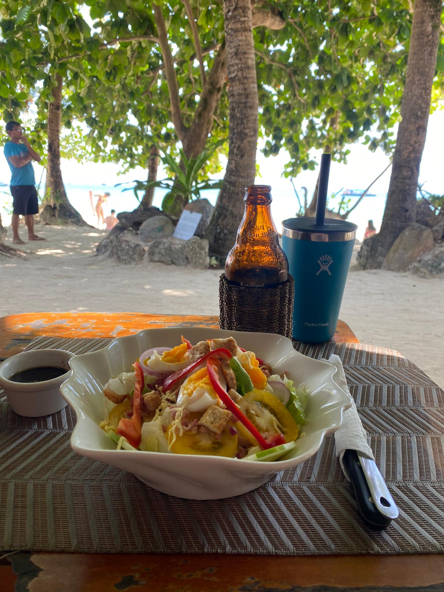 A light lunch and beer on the beachfront.