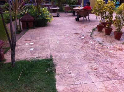 We saw hotel personnel cleaning the table by trowing used napkins on the ground around the pool.