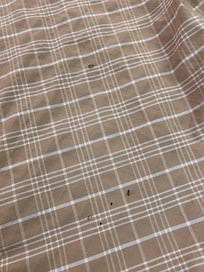 Cigarette burn holes