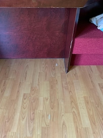 Damaged floor and furniture