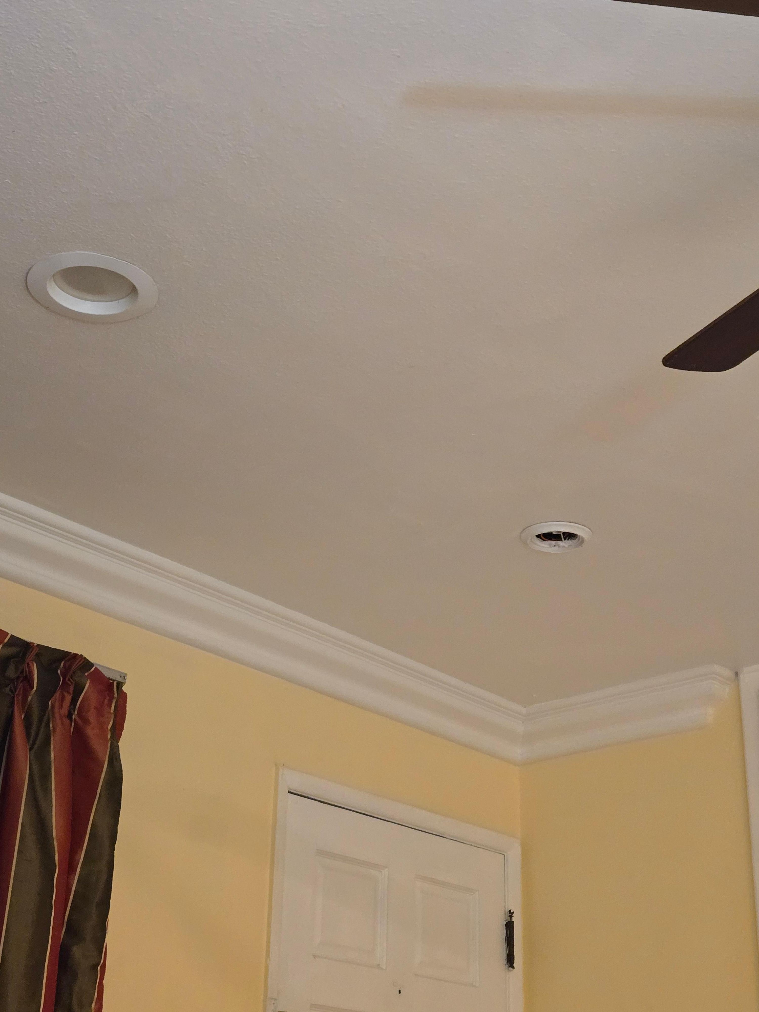 Missing light fixture on the right, burnt out bulb on the left. 