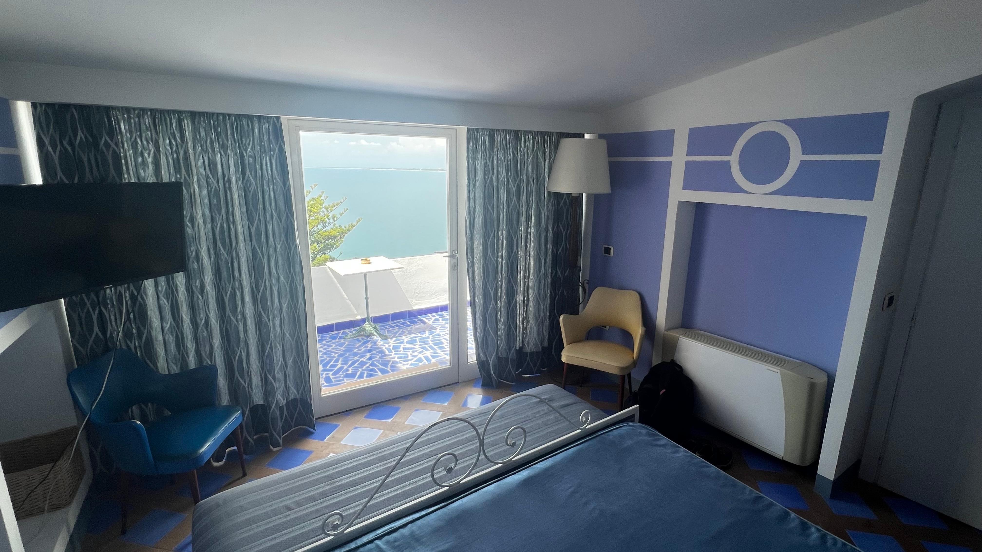 Room with balcony looking over the cliff top