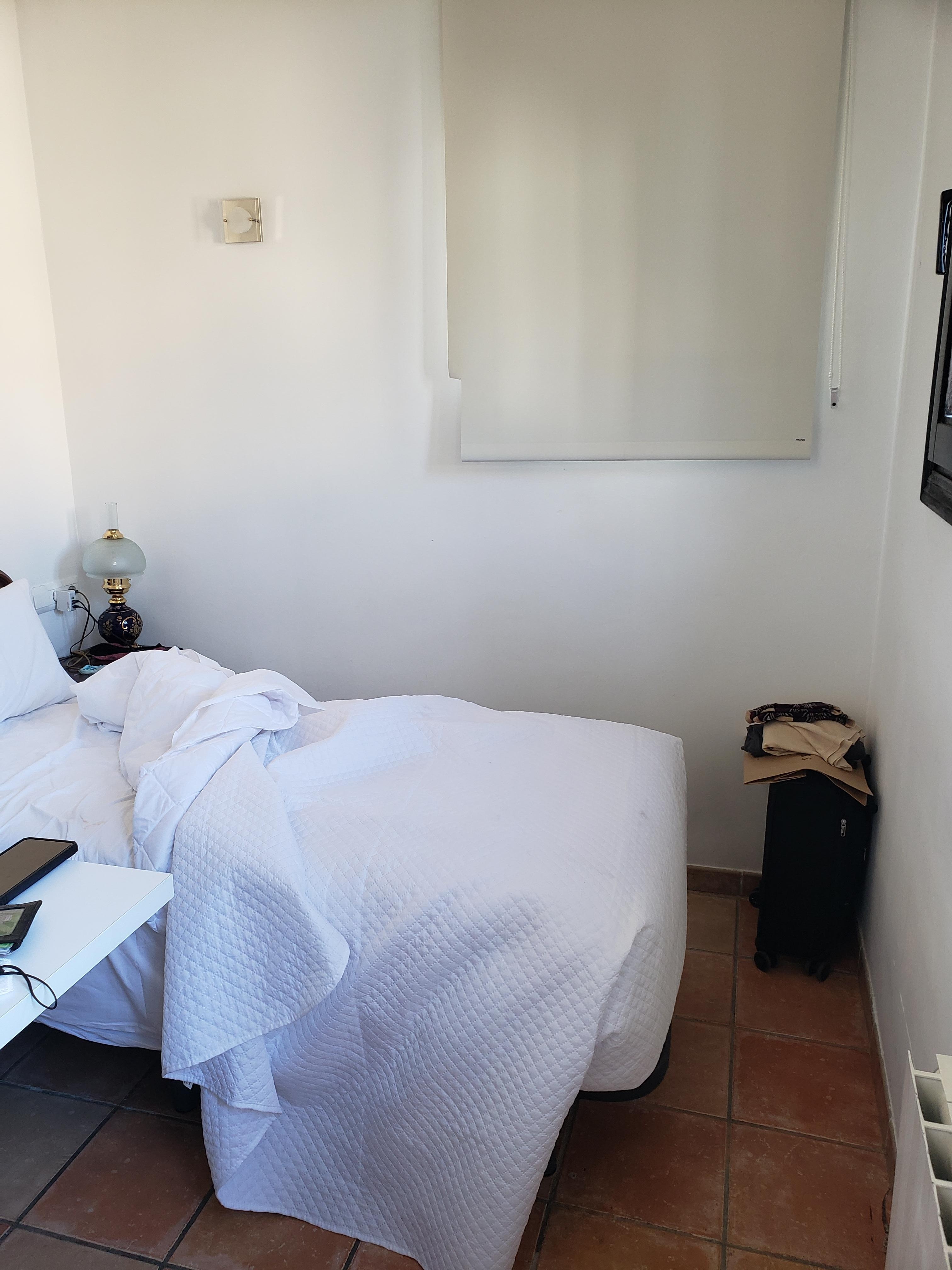 This is what they call a room. The room was so small and did not include any chairs, desks/tables etc.