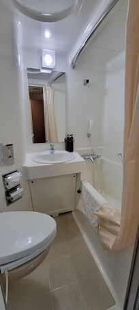 Bathroom a little tight, but dooable. I have no complaints using it.