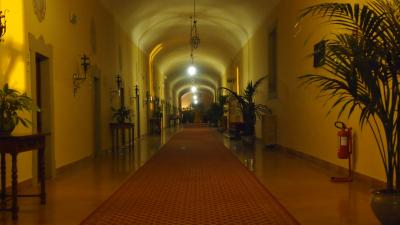 Corridor with hotel rooms in the old munk cells