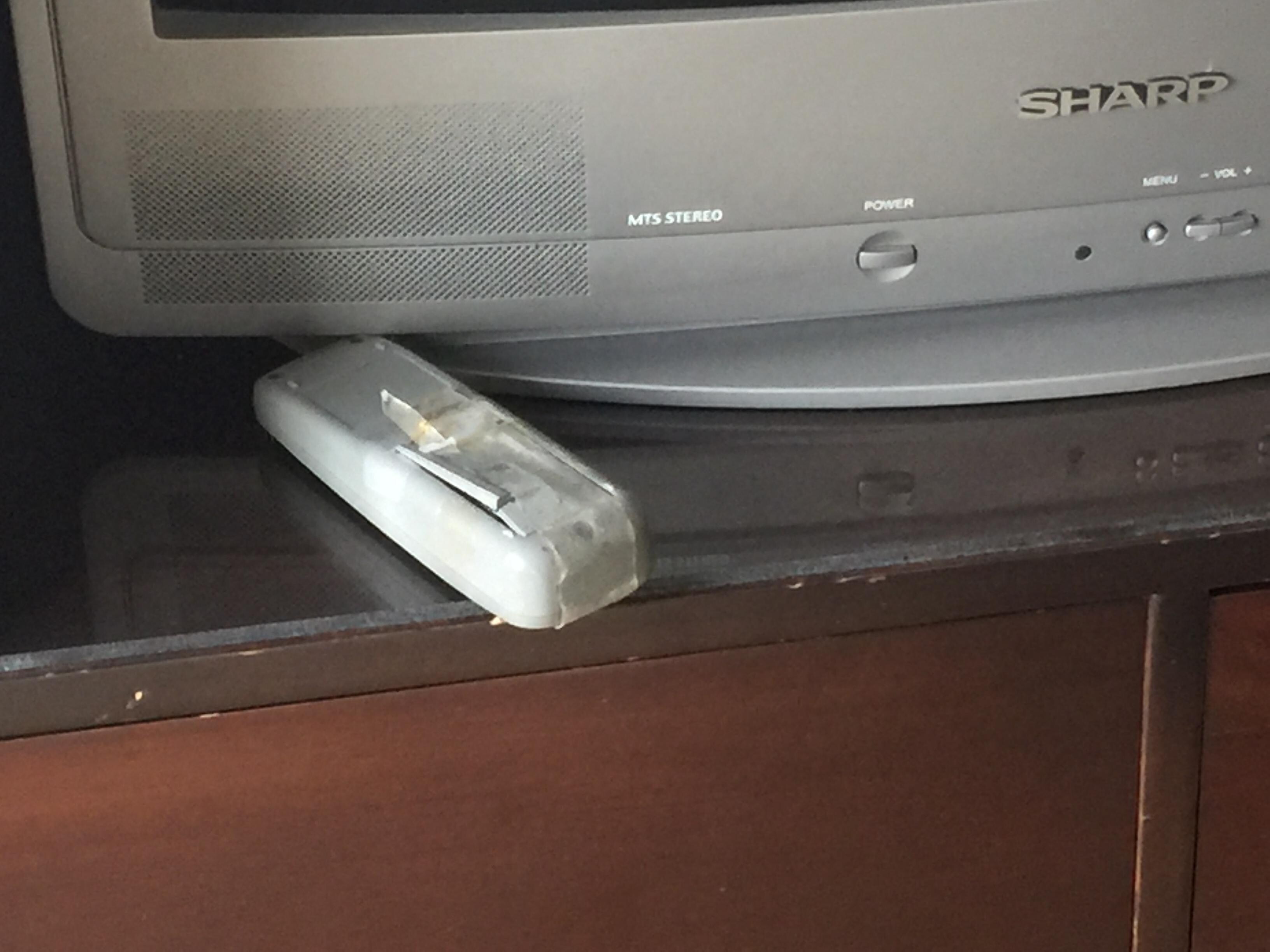 Tv remote with medical tape.