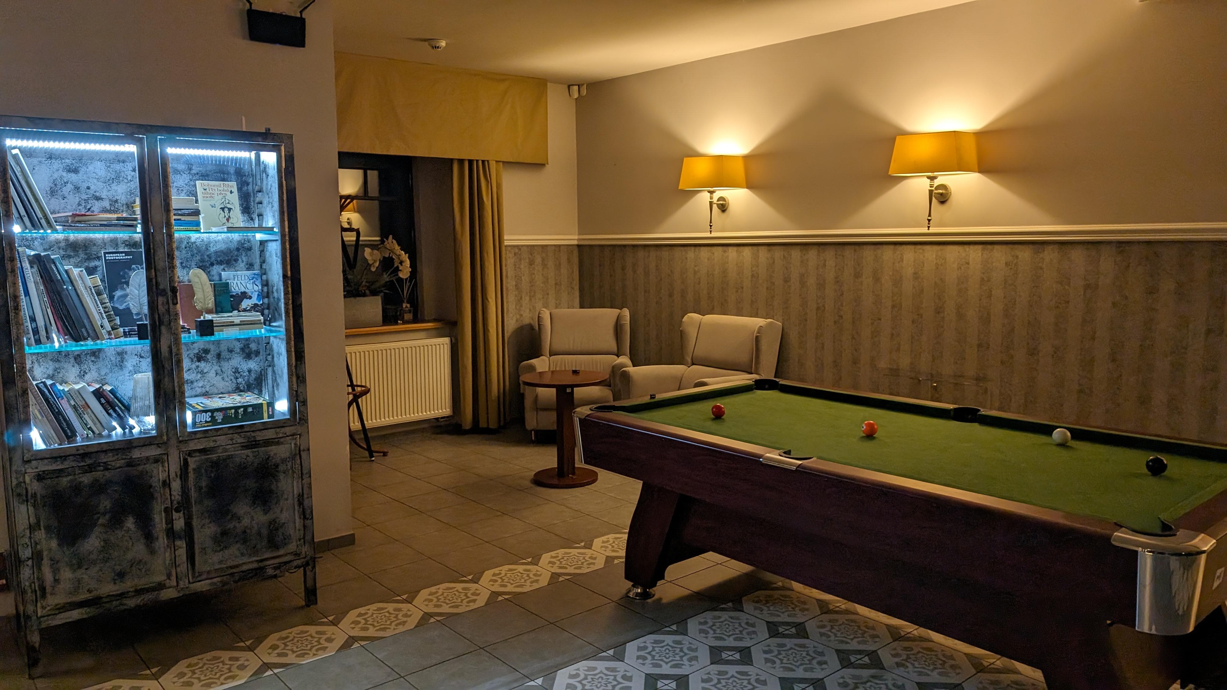 Lobby with a pool table.