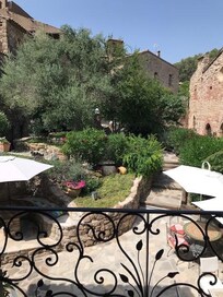 Front view from the hotel courtyard garden and breakfast terrace