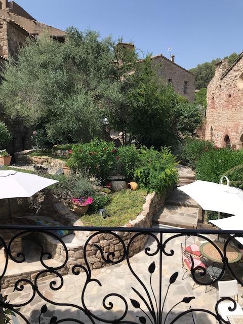 Front view from the hotel courtyard garden and breakfast terrace