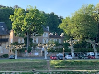 The hotel seen from the other side of the river.