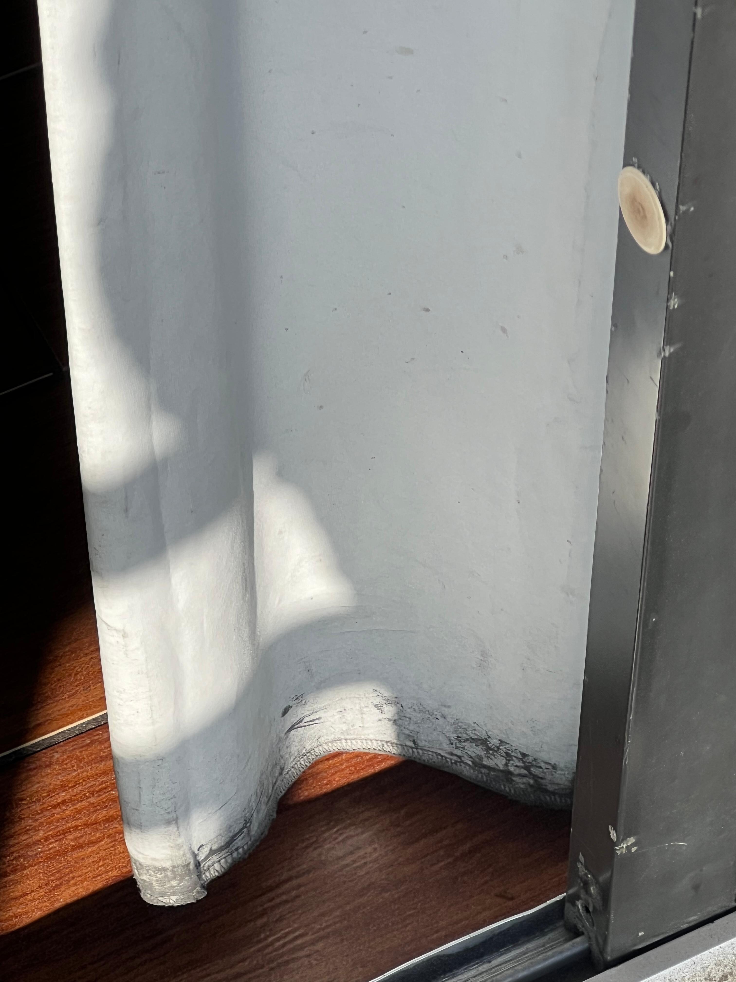 Mold on balcony door curtain