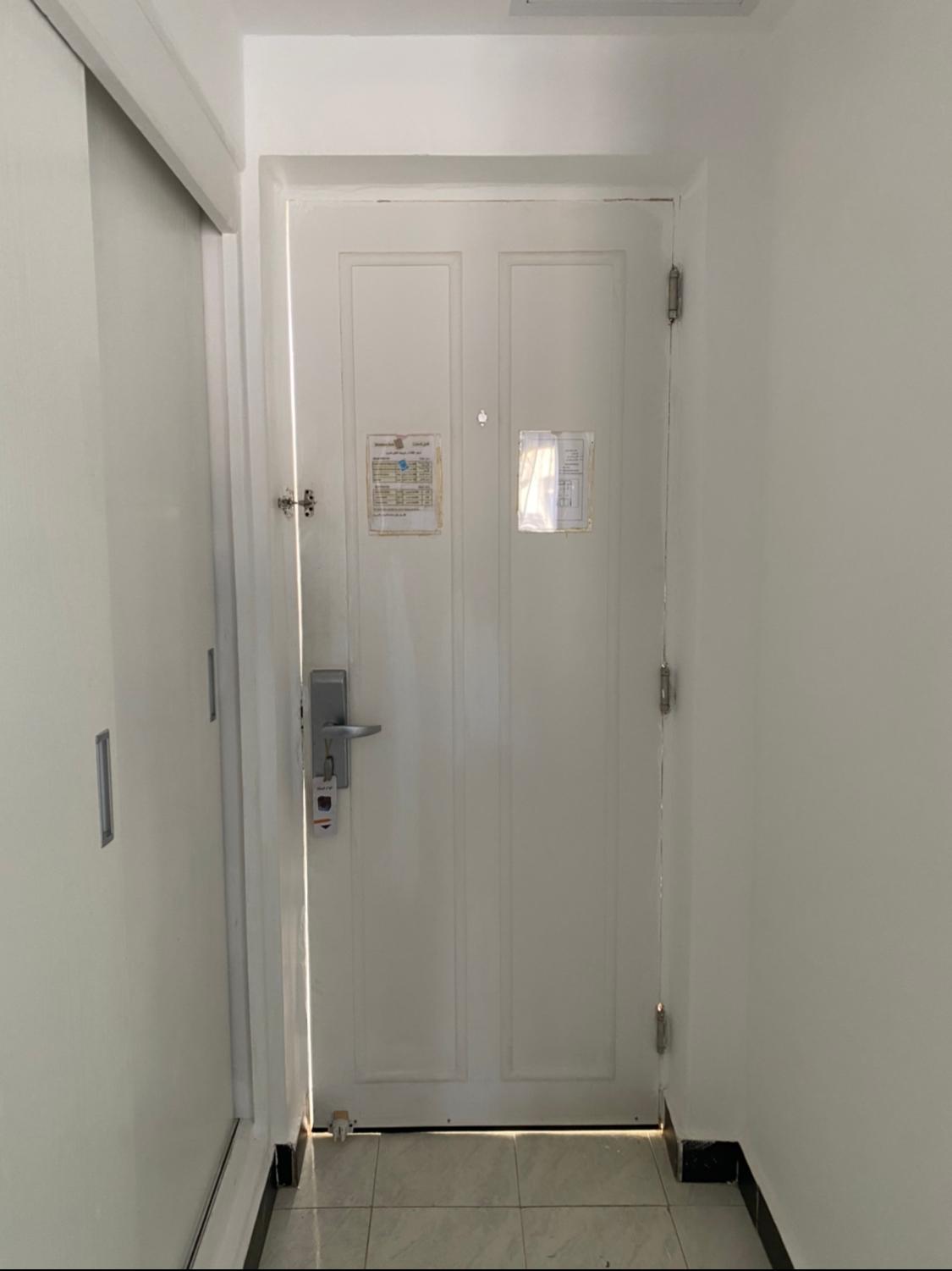 The not closing door (we can see outside all around)