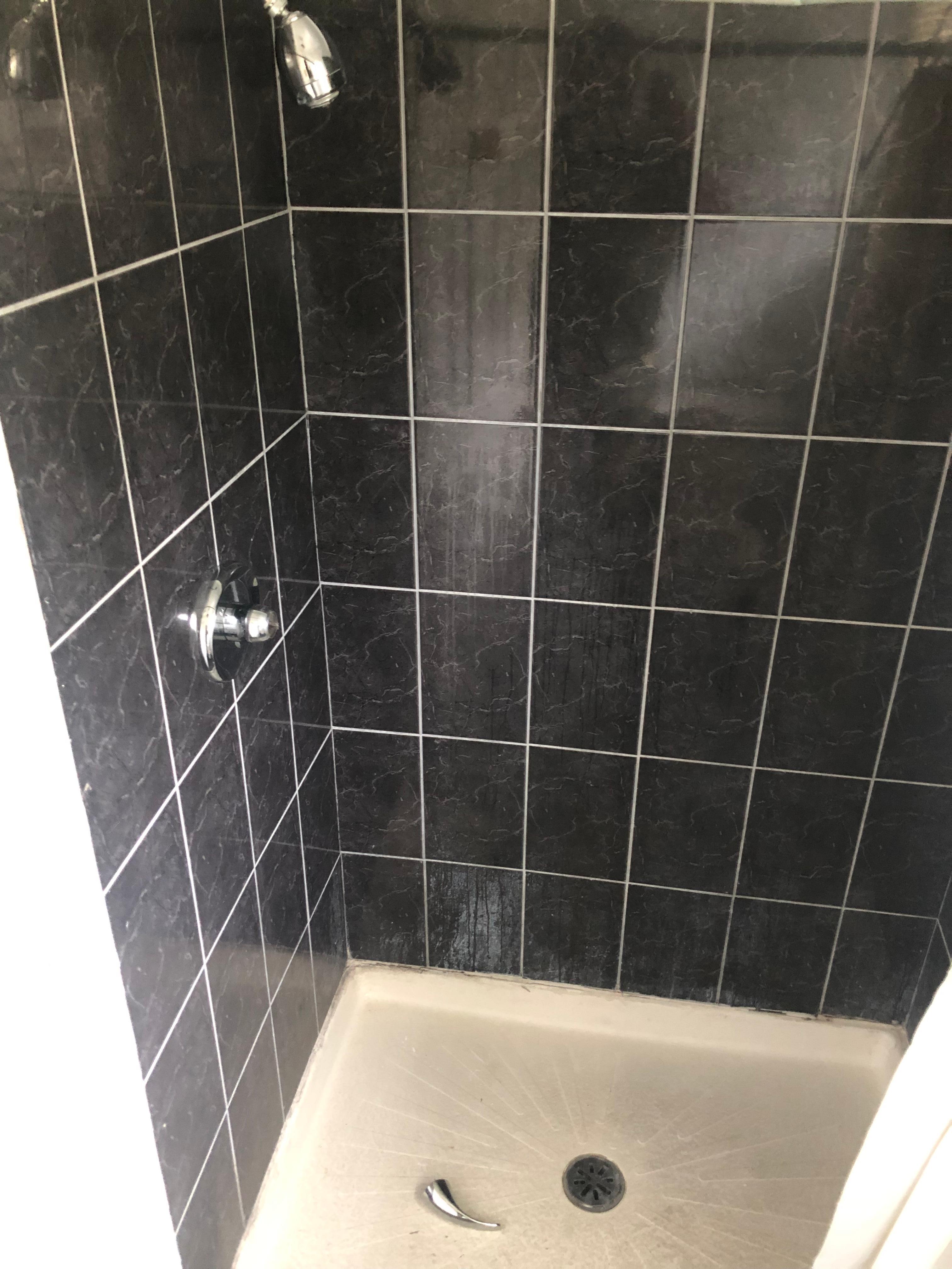 This is a photo of the broken shower which was also filthy.