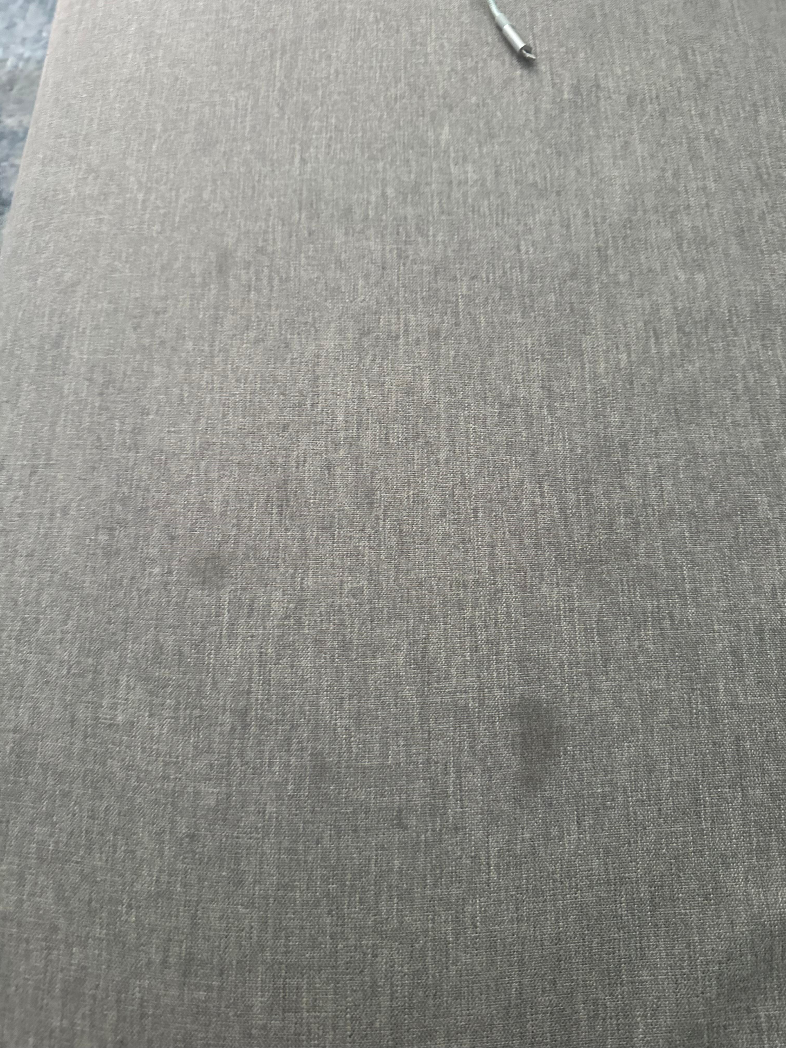 Stains on the sofa bed.