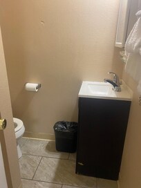 Small bathroom, theres a dent in the wall but oh well