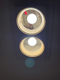 No covers over the lights in the bathroom
