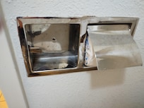 This was the toilet paper dispenser!!