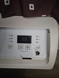Thermostat where you must put your finger in the hole to turn on and off