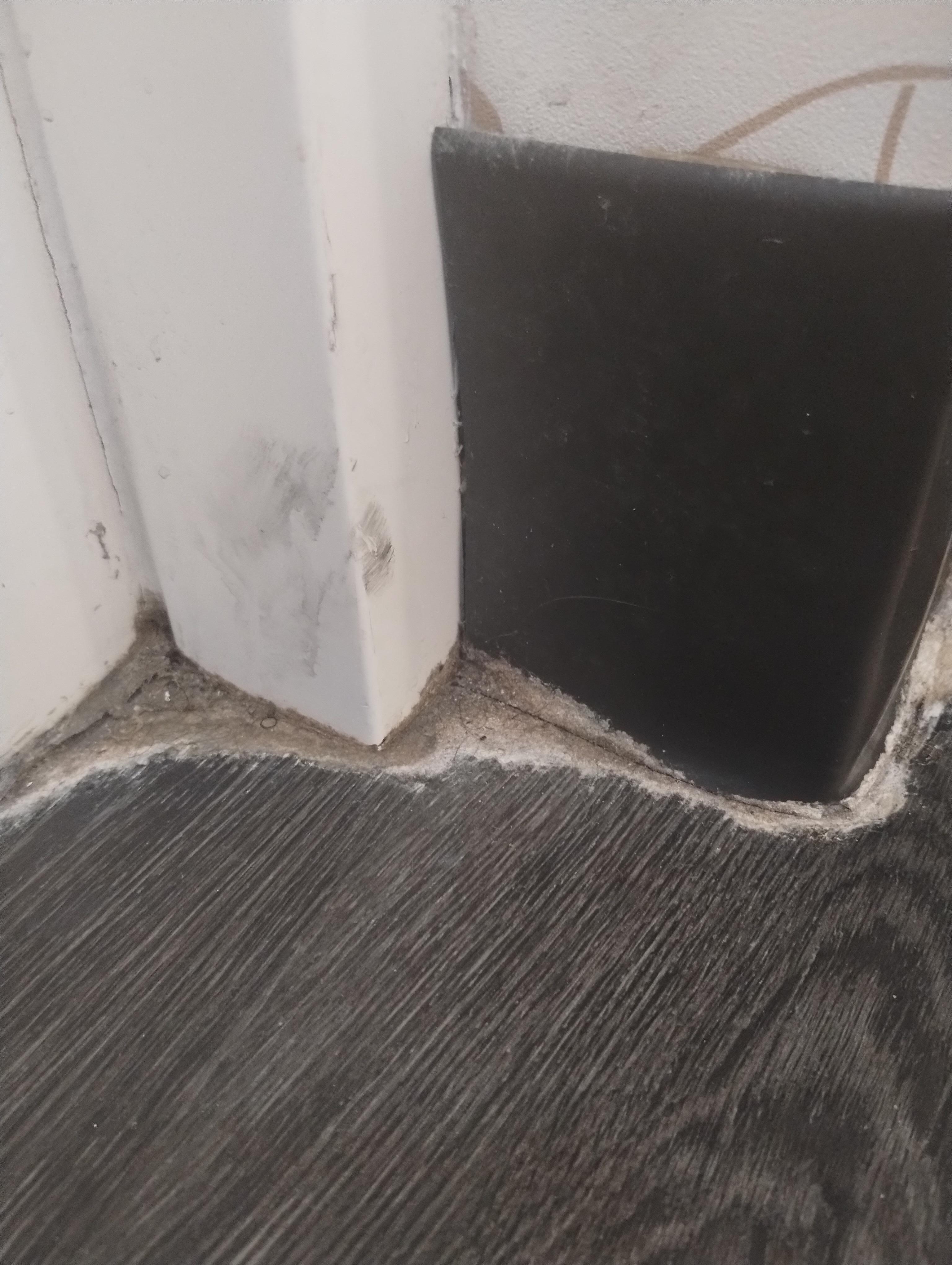 Nasty filth in every corner of bathroom floor