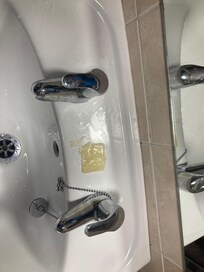 What was left of the only item to wash with in the wash basin and shower after two people had used it for two days.