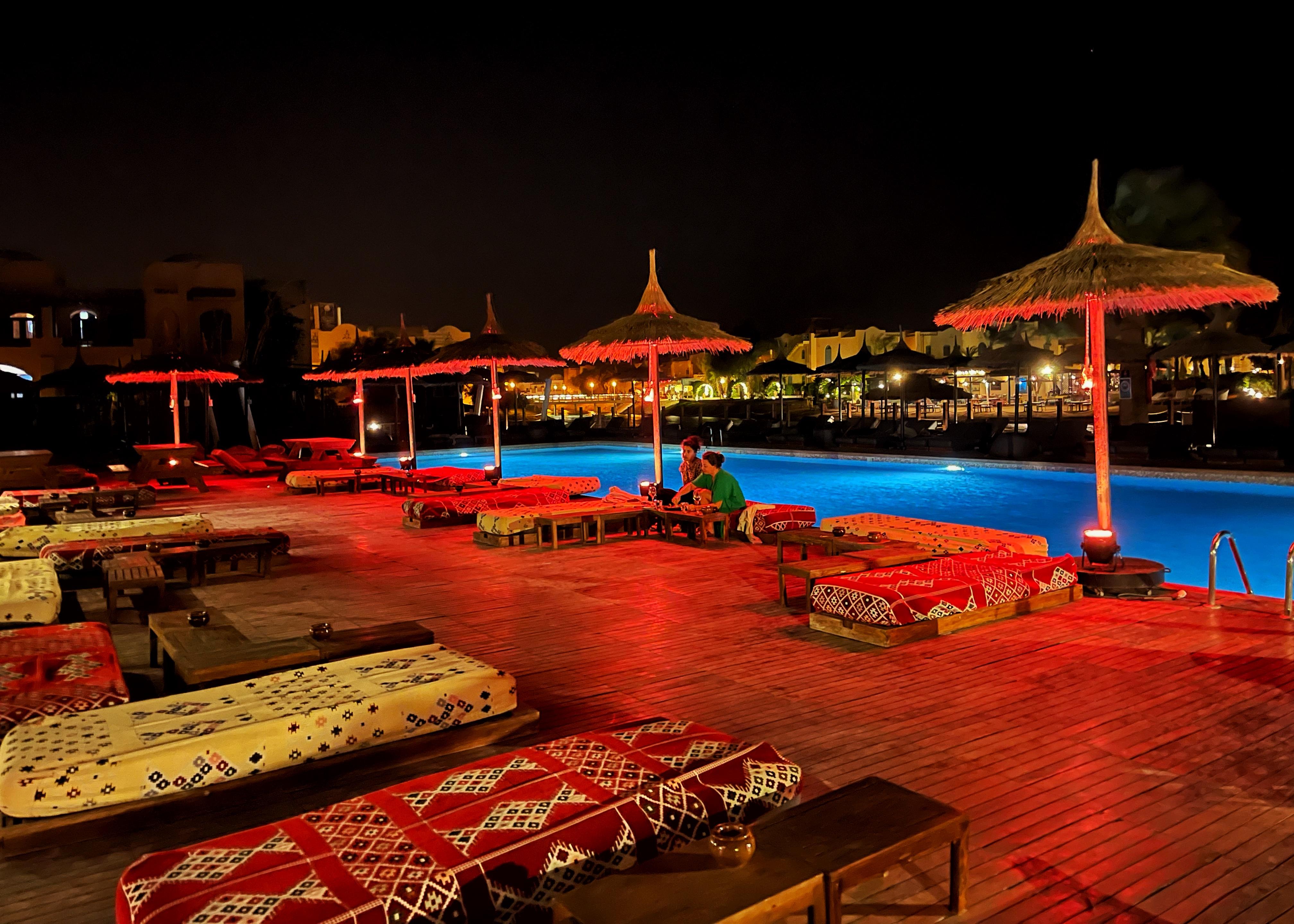 Resort pool at night.